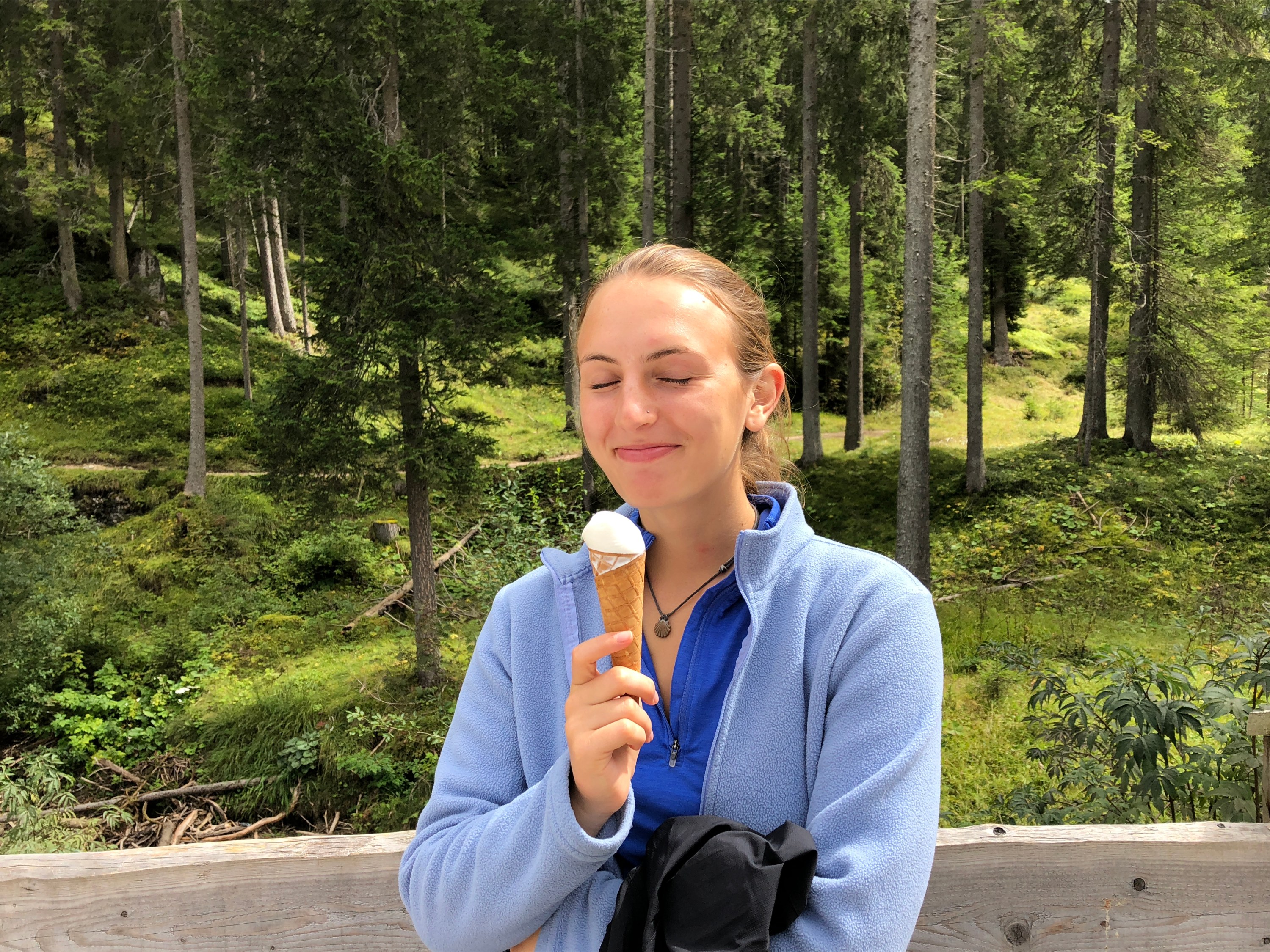 happy girl eating gelato in italy